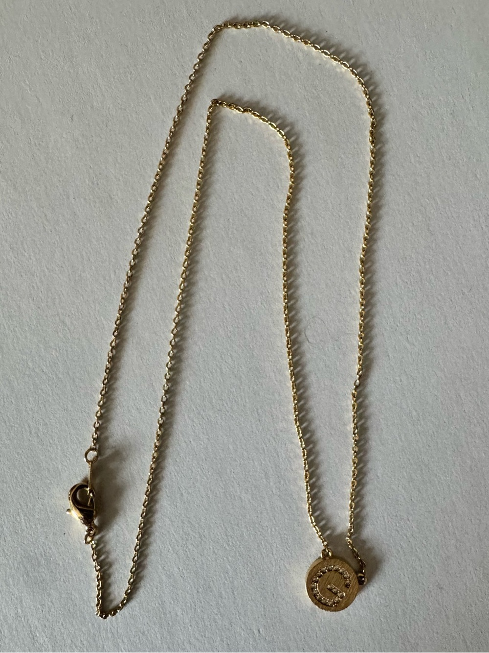 Gold-Tone 'G' Crystal Disc Necklace